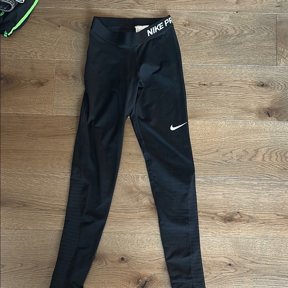 Nike Black Leggings with Form-Fitting Design and Wide Waistband